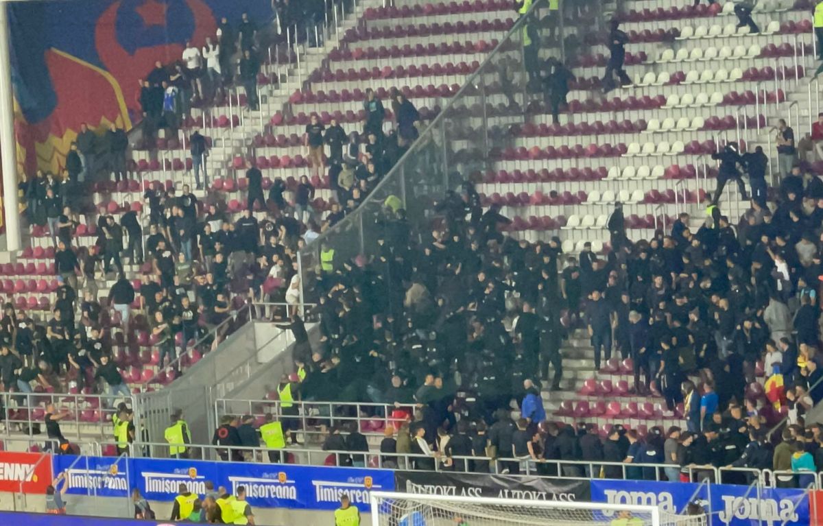 UEFA žestoko kaznila Nogometni savez BiH neredi navijačana tribinama na utakmici BiH Rumunija policajci pokušavaju smiriti haos na tribinama dosta policajaca i navijača ispod transparent